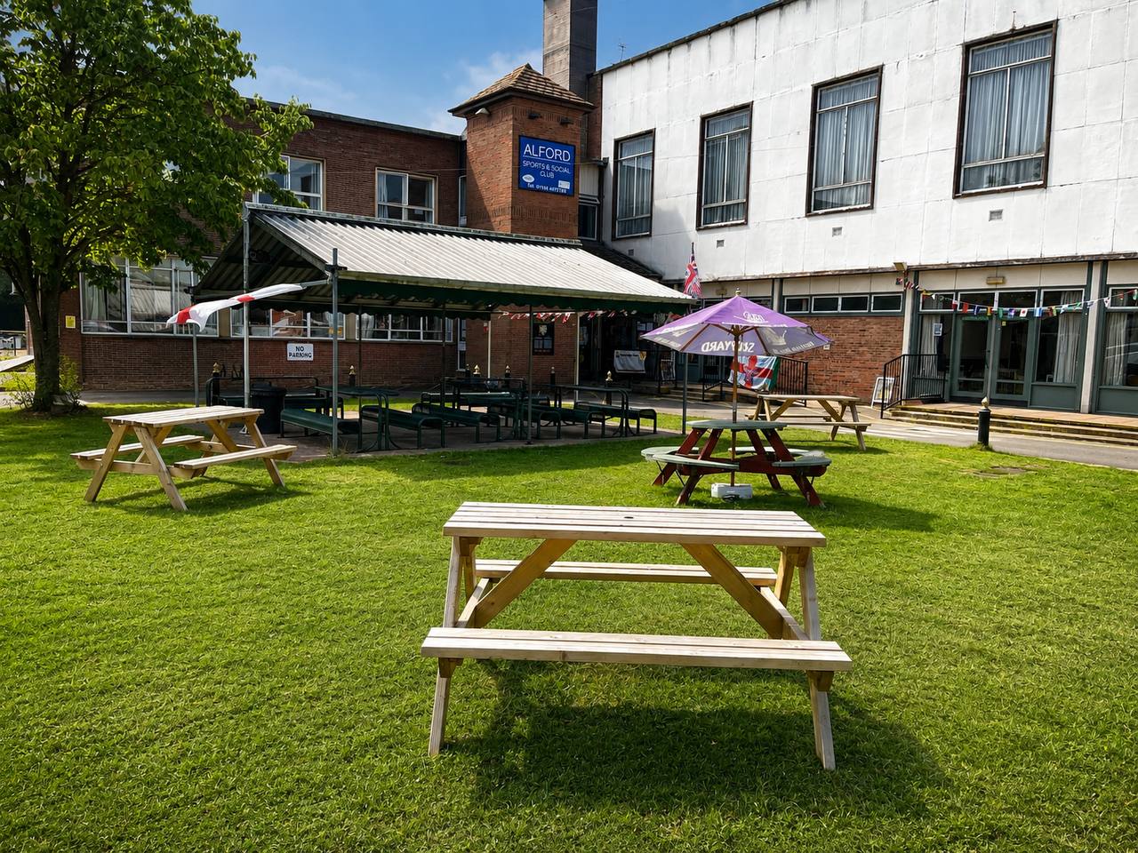 Beer garden and outdoor seating area at Alford Hall