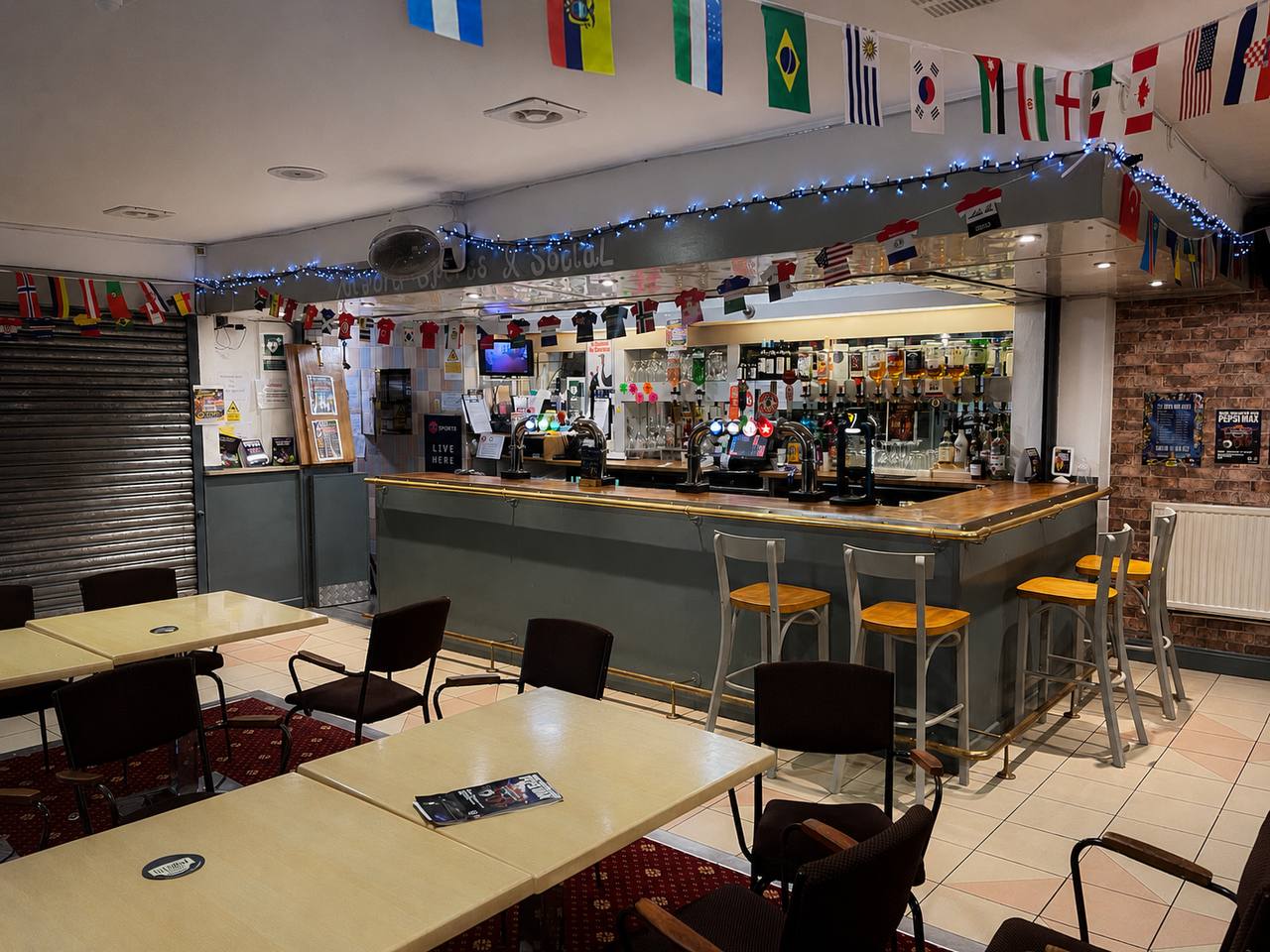Members bar at Alford Hall, the main social space with seating and bar area